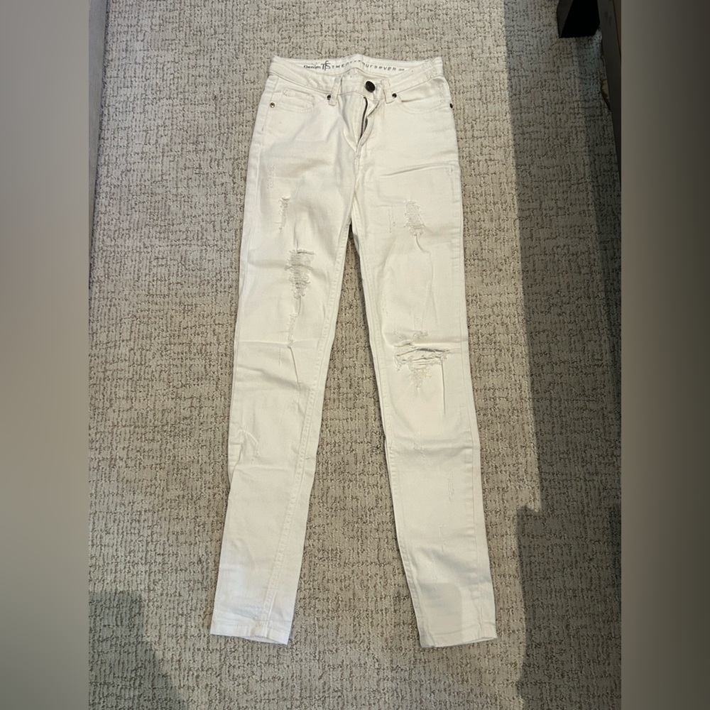 Ripped white skinny jeans